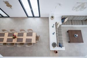 an overhead view of a dining room with a table and chairs at Villa Oneiro Kefalos in Kefalos