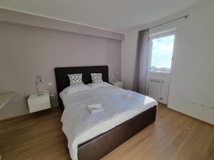 Кровать или кровати в номере Residence La Villa Opale +13 фотографий