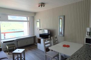 Kuchyň nebo kuchyňský kout v ubytování Tignes Joli Studio avec vue imprenable sur le lac