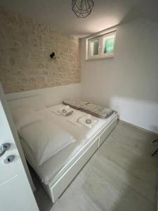 Ein Bett oder Betten in einem Zimmer der Unterkunft Citadela