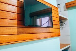 TV a/nebo společenská místnost v ubytování Hotel Pato Branco