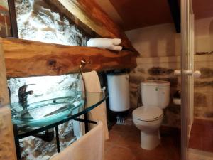 Ванная комната в Las Henrenes