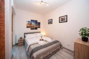 Posteľ alebo postele v izbe v ubytovaní Maya's Flats & Resorts 17 - NADMOTLAWIE