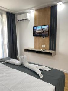Postel nebo postele na pokoji v ubytování Hotel Unirea