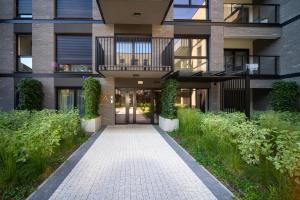 Vonkajšia záhrada v ubytovaní Maya's Flats & Resorts 17 - NADMOTLAWIE