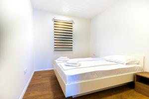 Posteľ alebo postele v izbe v ubytovaní ISLAND GETAWAY