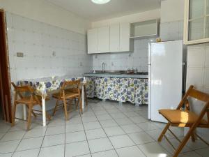 Kuchyň nebo kuchyňský kout v ubytování Villa Muntiranni