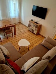 TV a/nebo společenská místnost v ubytování Zum Jakobi 4