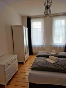 Postel nebo postele na pokoji v ubytování Zum Jakobi 4