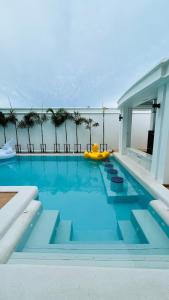 Bazén v ubytování Elysium Pool Villa nebo v jeho okolí