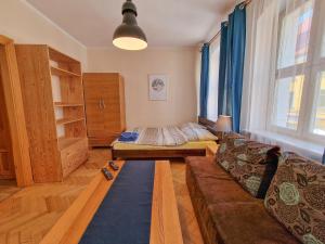 Ein Bett oder Betten in einem Zimmer der Unterkunft Apartament księżycowy