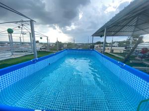 Piscine de l'établissement 6-1 SANTIAGO CITY GREAT COZY APT TO STAY - Cozy 3 bedrooms Apartment for 7 peoples - close to all kind the business wifi - Air Condition ou située à proximité