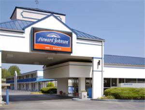 a sign on the front of a commercial building at Howard Johnson by Wyndham Commerce GA in Commerce