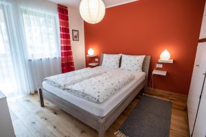 Posteľ alebo postele v izbe v ubytovaní Apartment ARGENTIS Krumas-Living - Kronplatz