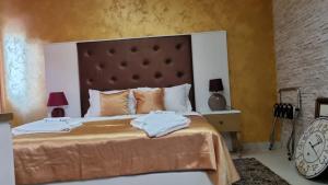 Łóżko lub łóżka w pokoju w obiekcie Villa Natka
