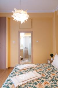 Posteľ alebo postele v izbe v ubytovaní Acropolis Sweet House 3