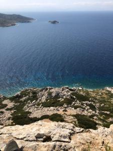 an aerial view of a rocky island in the ocean at Irene Double Apartment Katoi in Symi