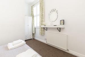 York City Center Apartments with Free Private Parkingにあるベッド +12枚の写真