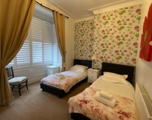 York City Center Apartments with Free Private Parkingにあるベッド