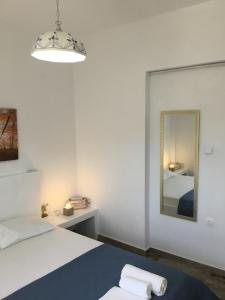 Postel nebo postele na pokoji v ubytování VILLA LEMONIA