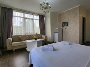 Voodi või voodid majutusasutuse MITE Hotel toas