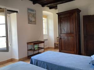 Ένα ή περισσότερα κρεβάτια σε δωμάτιο στο Casa Valentini