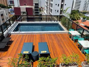 a swimming pool on the roof of a building at Hotel do Mar Tambaú in João Pessoa