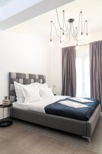 Posteľ alebo postele v izbe v ubytovaní Monastiraki Sweet House 1