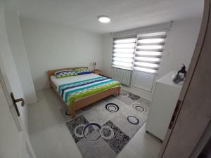 Postel nebo postele na pokoji v ubytování Apartment Maida