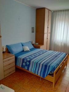 Un pat sau paturi într-o cameră la B&B Monte Acuto
