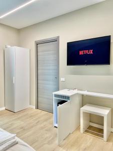 TV a/nebo společenská místnost v ubytování B&B Controvento Soiano