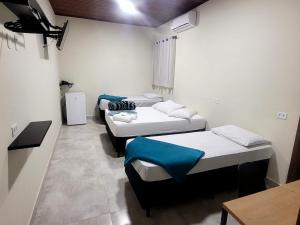 Postel nebo postele na pokoji v ubytování Hotel Serra do Mar
