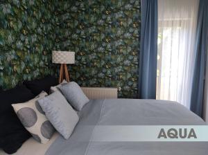 Postel nebo postele na pokoji v ubytování DV Premium Apartments