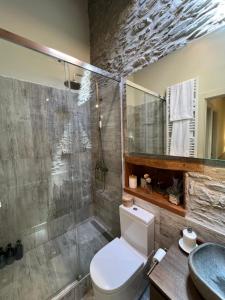 a bathroom with a shower and a toilet and a sink at MESON DU BONHEUR in Osséja +45 photos