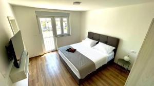 Posteľ alebo postele v izbe v ubytovaní Studio Apartmani Kaja i Iva