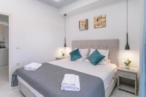 Voodi või voodid majutusasutuse Callinica Hotel toas