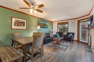 a living room with a table and a couch at Powderhorn Lodge 214 Perfect Solitude Escape in Solitude