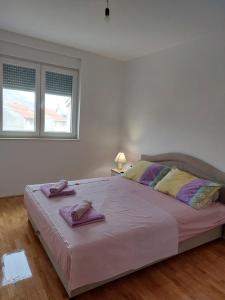 Кровать или кровати в номере Apartments Elena