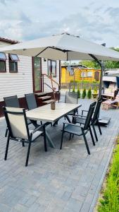 Ein Patio oder anderer Außenbereich in der Unterkunft Ferienhaus Vienna am Kronensee