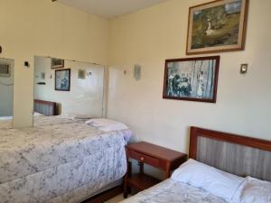 Ένα ή περισσότερα κρεβάτια σε δωμάτιο στο Salinópolis - Apartamento Varandas do Atlântico