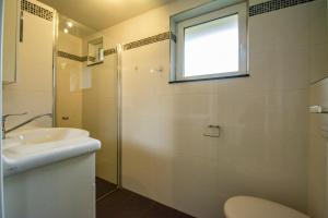 Koupelna v ubytování Garnekuul 26 Callantsoog