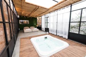 A bed or beds in a room at Essential suite