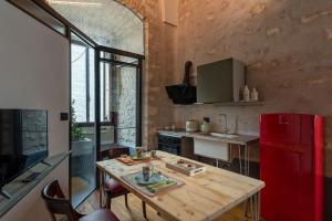 Cucina o angolo cottura di Il Quinto Elemento - Residence Of Charme