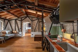 Postel nebo postele na pokoji v ubytování Il Quinto Elemento - Residence Of Charme + 37 fotografií