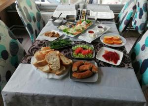 a table with several plates of food on it at Yağız İndigo Blue in Şile
