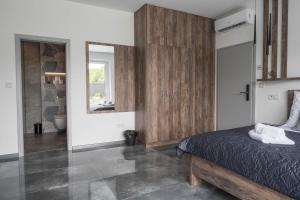 Posteľ alebo postele v izbe v ubytovaní Veltlin Bed & Wine