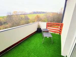 En balkong eller terrass på Sunshine apartment for 6 & Terrase & Free Parking