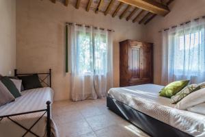 Ένα ή περισσότερα κρεβάτια σε δωμάτιο στο Villa del Duca +35 φωτογραφίες