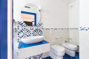 Um banheiro em Don Leonardo - pool and wellness