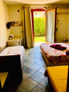 A bed or beds in a room at La Casa di Linda